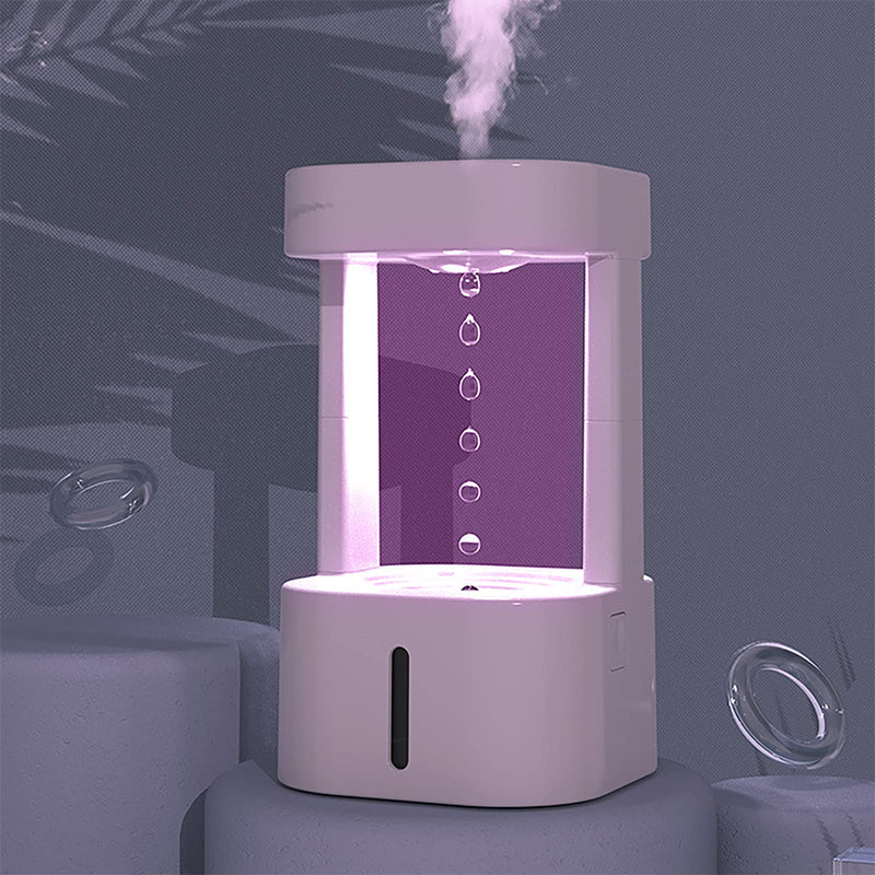 Modern humidifier with purple LED light and mist output, ideal for home comfort and air quality.
