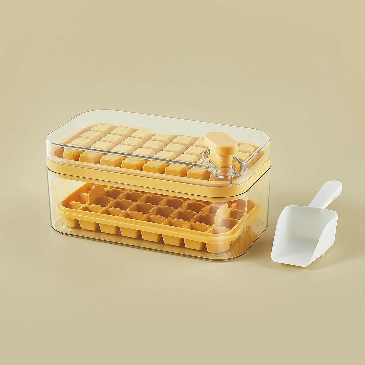 Yellow ice cube tray with lid and scoop, kitchen organizer for freezer storage